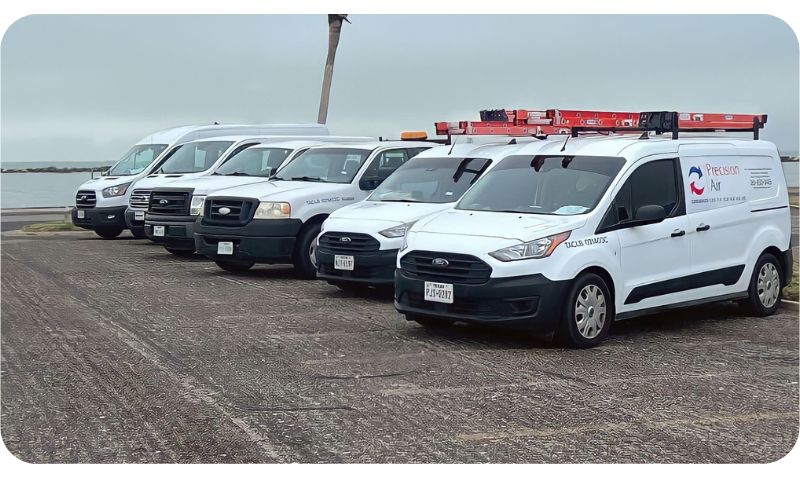 A fleet of Precision Air work vans fully stocked for AC repair and Installations.